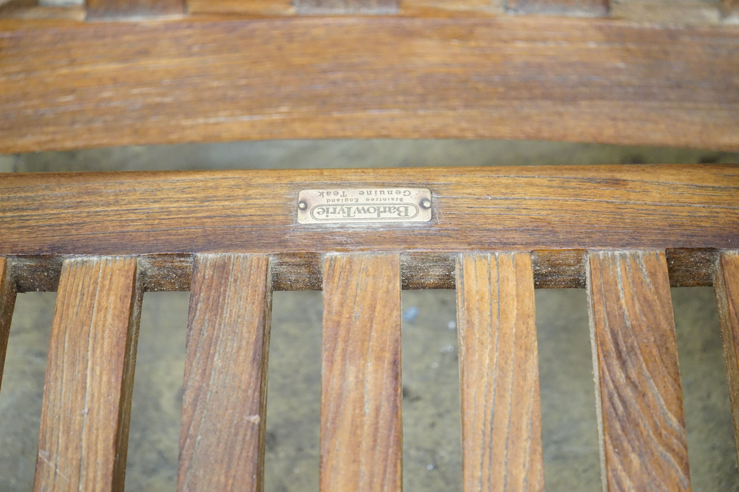 A teak brass mounted garden steamer chair, labelled Barlow Tyrie